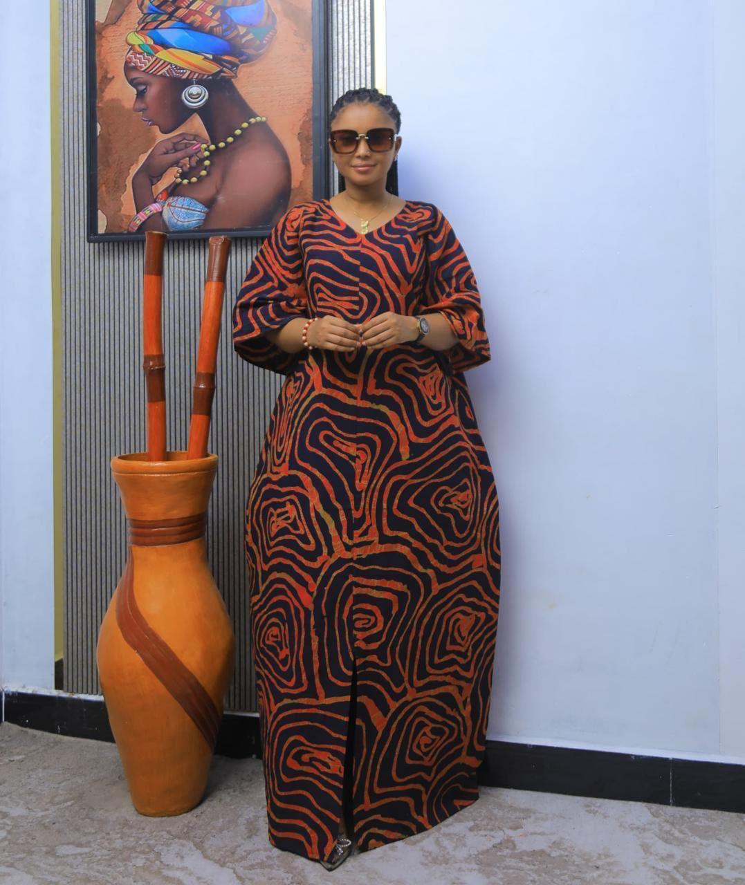 A beautiful maxi dress with a stunning pattern.