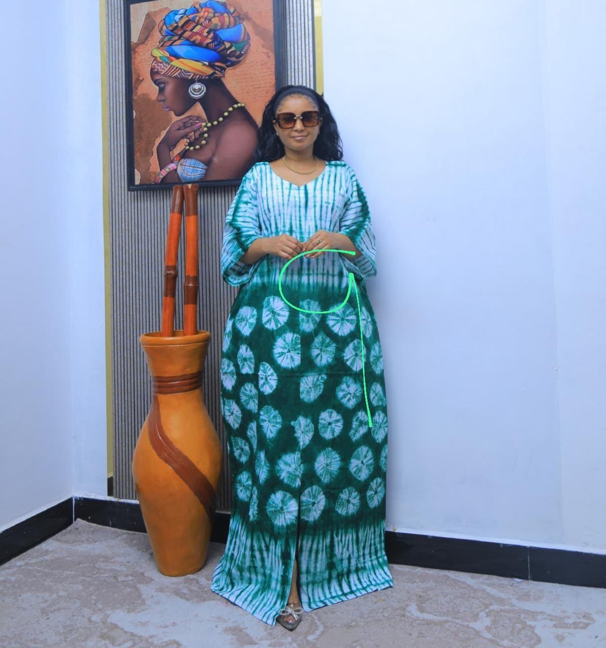 A maxi dress with a v-neck and three-quarter sleeves