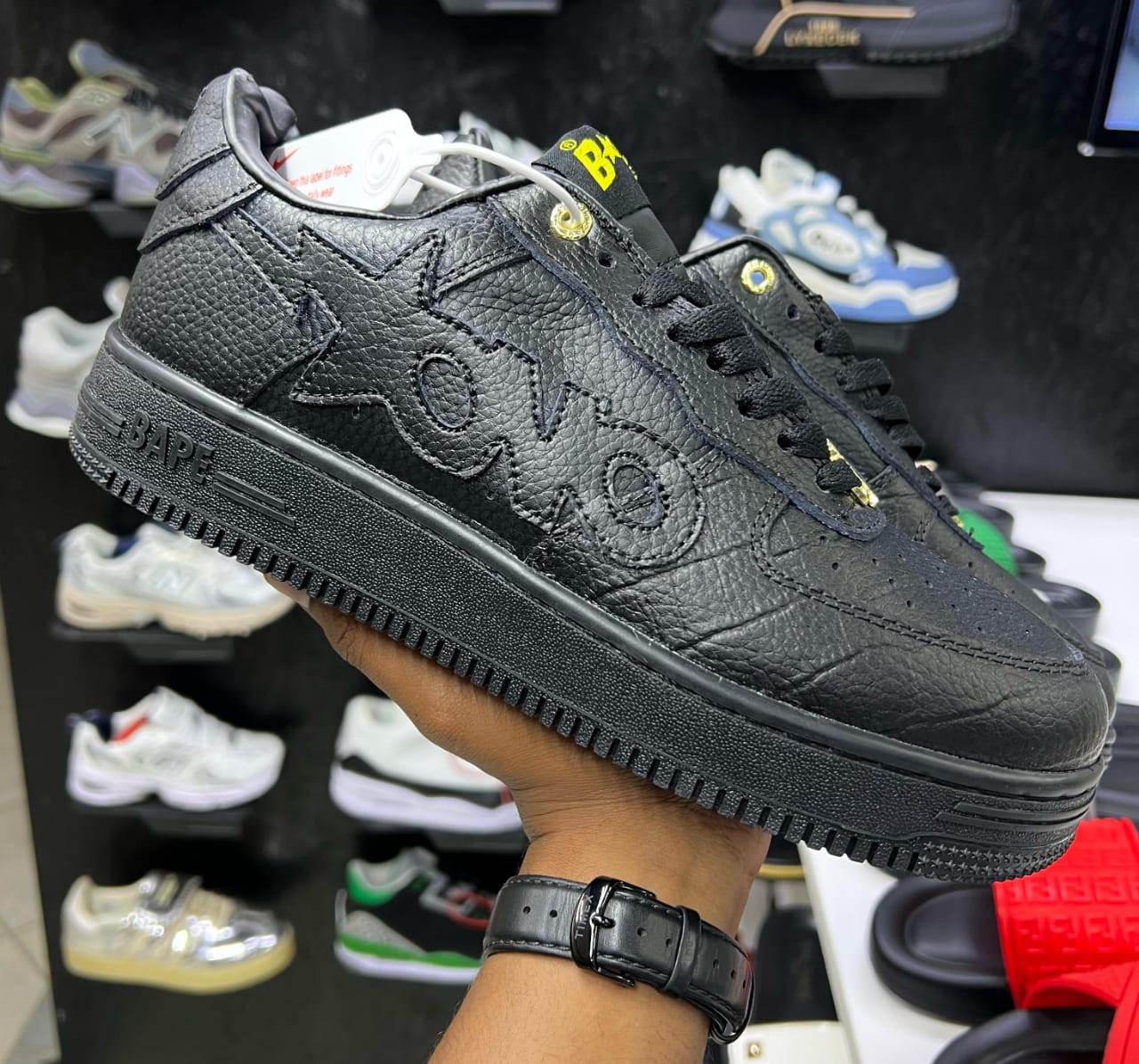 Stylish sneakers with embossed logo